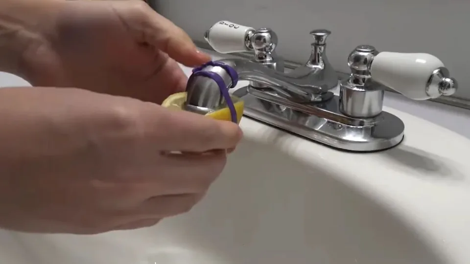 Hands repairing a bathroom faucet handle, Faucet and Sink Repair in Downey, CA