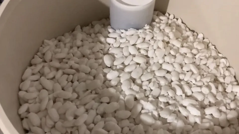 Water softener salt pellets in a brine tank, Water Softener Service in Downey, CA